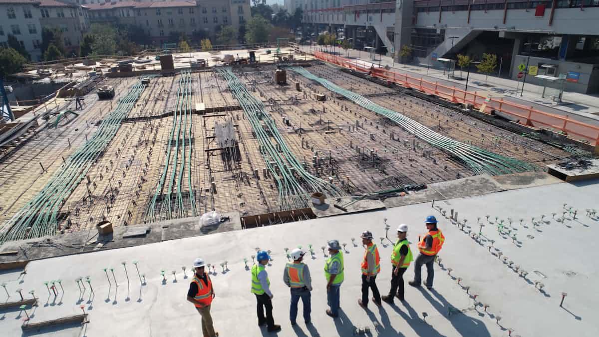 Construction engineers reviewing work on site, a marker of a well-run building company