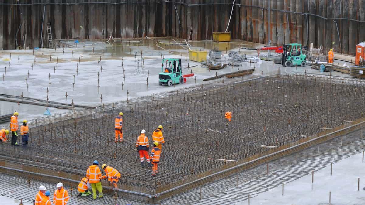 Construction labourers working on a residential building site