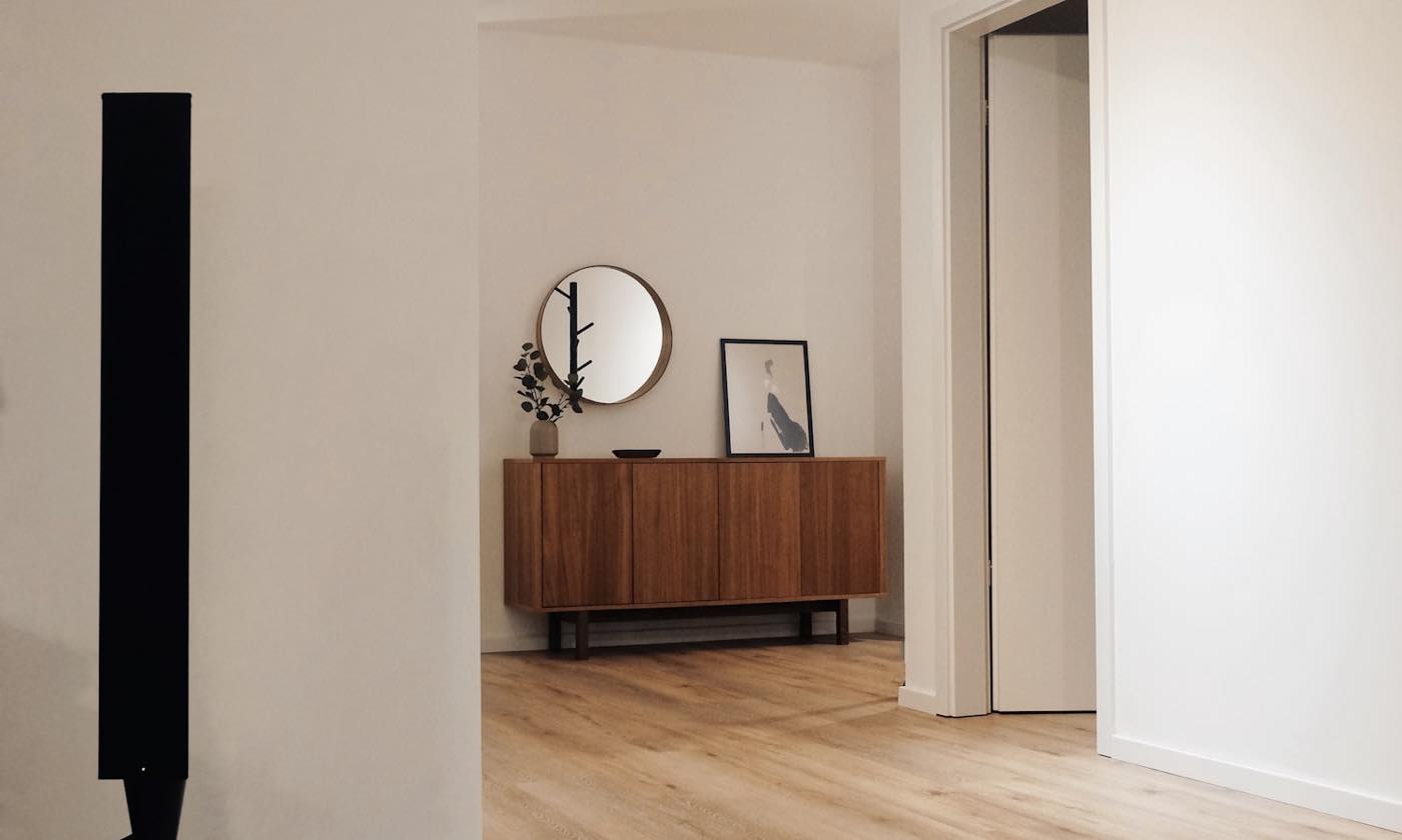 Restored mid-century home interior in North Nazimabad Karachi by Naffees & Sons — original terrazzo and joinery preserved alongside a modernised layout
